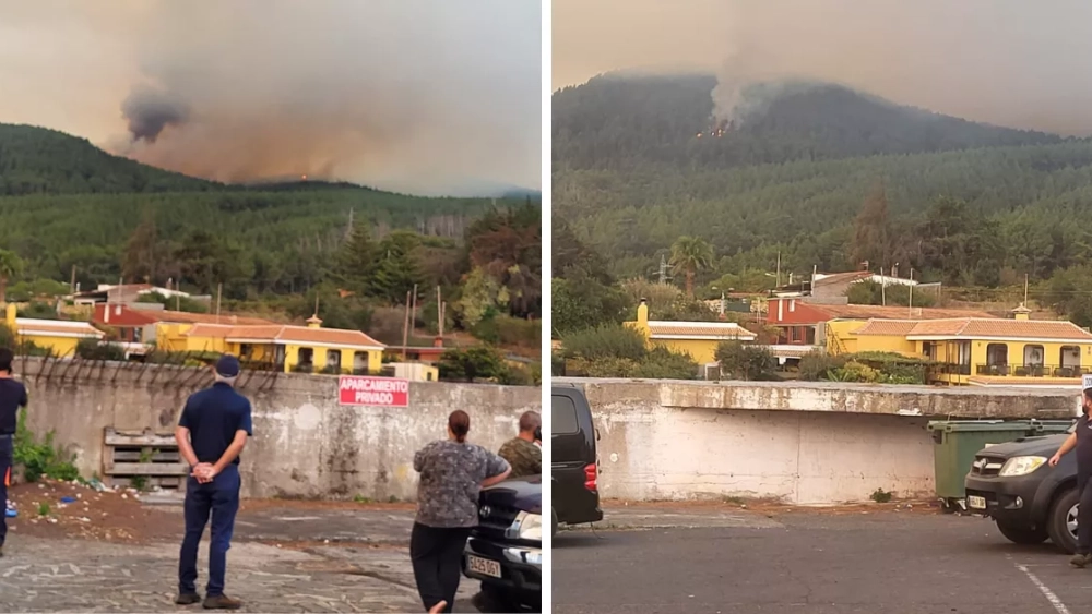 Personas mirando las llamas desde el aparcamiento del Alteza en Las Rosas (El Rosario)./ CEDIDAS